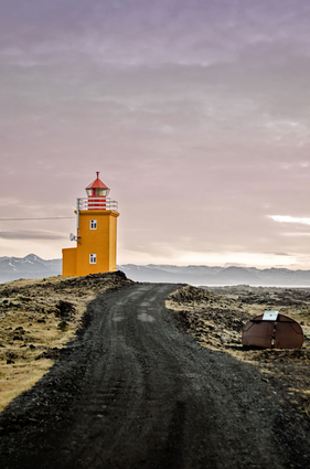 Lighthouse At Sunrise In Iceland